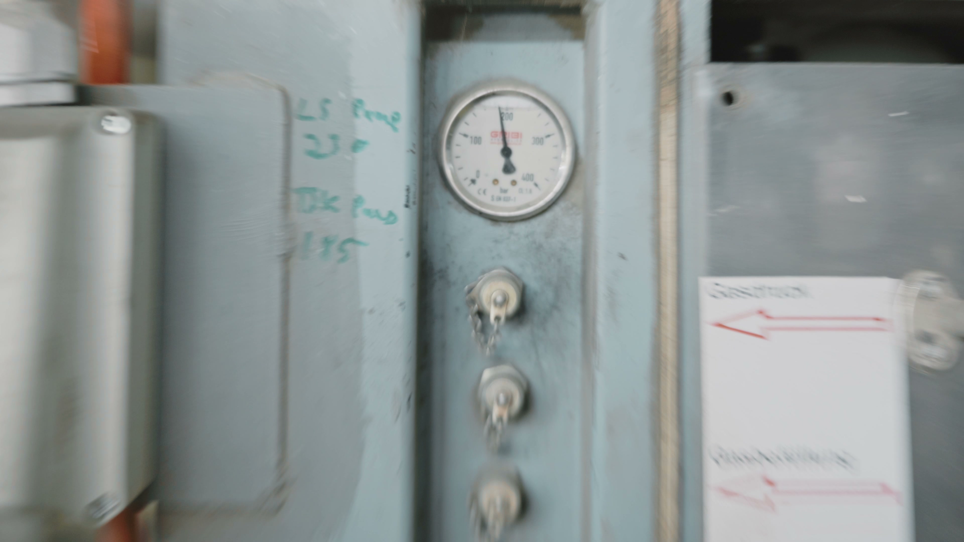 A pressure gauge photographed during a plant inspection