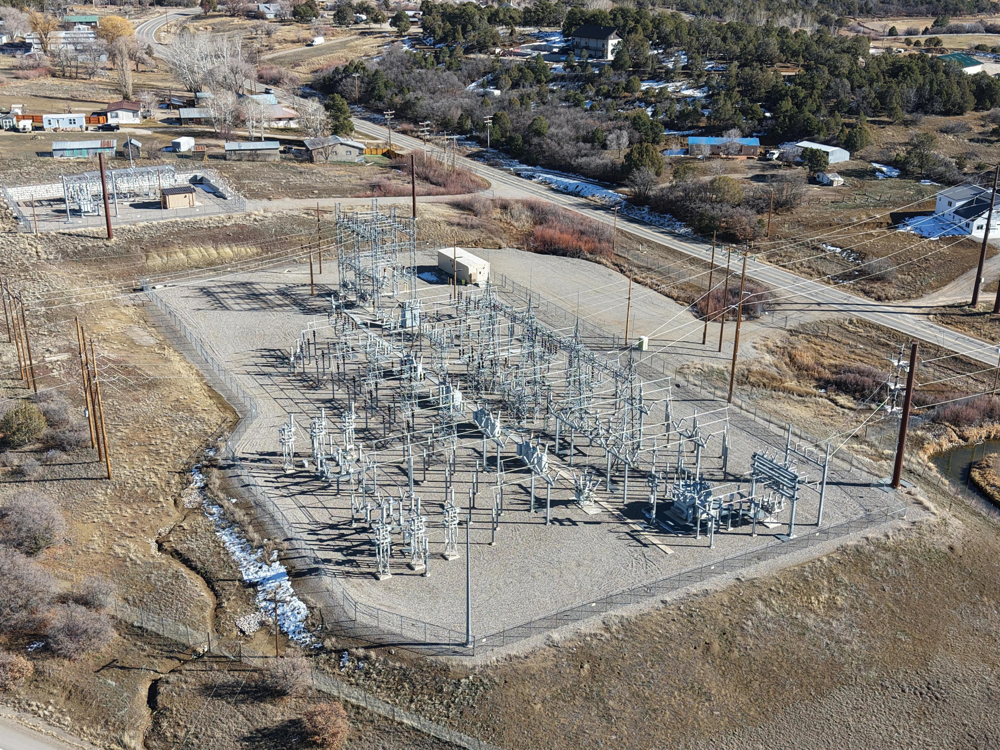 Aerial view of a high-voltage transmission substation near Bayfield, Colorado